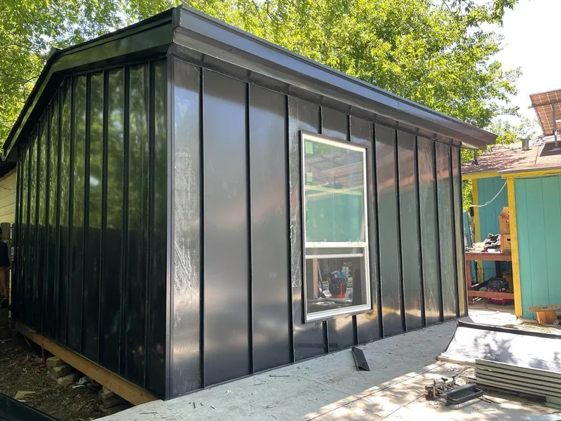 Black standing seam metal wall panels for Metal Roof Installation in Fox Chapel